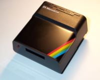 Externí paměťové zařízení Sinclair ZX Microdrive.