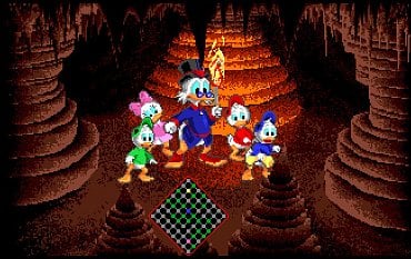 Autor: Michal Tauchman, podle licence: <a href="http://creativecommons.org/licenses/by-sa/4.0/deed.en">CC BY-SA 4.0</a> DuckTales - The Quest for Gold - Amiga. Zde je nejenom vidět lepší barevné vykreslení (ST vůbec v jeskyni nereflektuje světlo pochodně), ale hlavně plynulost hry na Amize je mnohem lepší. Lagy (hodně znepříjemňující ovládání) a dlouhé nahrávací časy na ST jsou pouze pro otrlé.