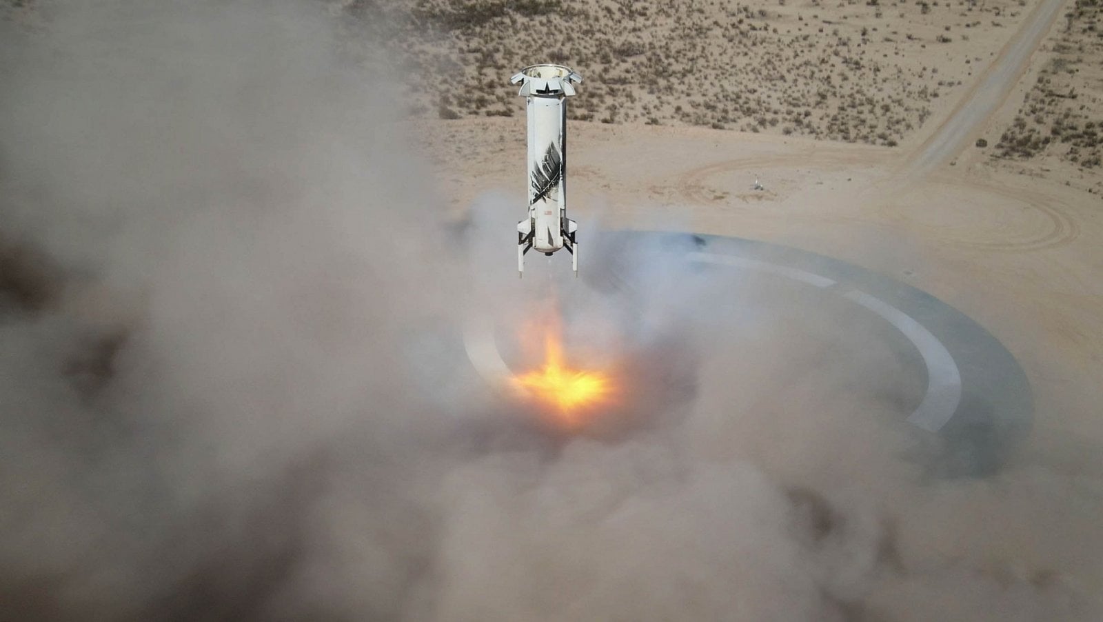 2021-06-blueorigin-ns14-booster-land-web.jpg