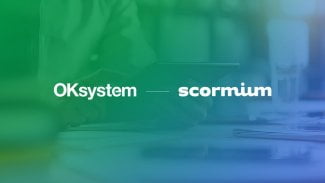 loga společností OKsystem a Scormium, oznámení akvizice