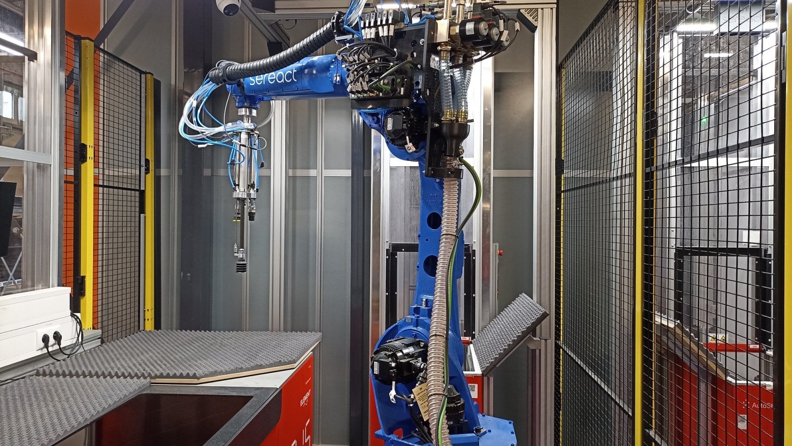 Robotická ruka pro chytání objednávek