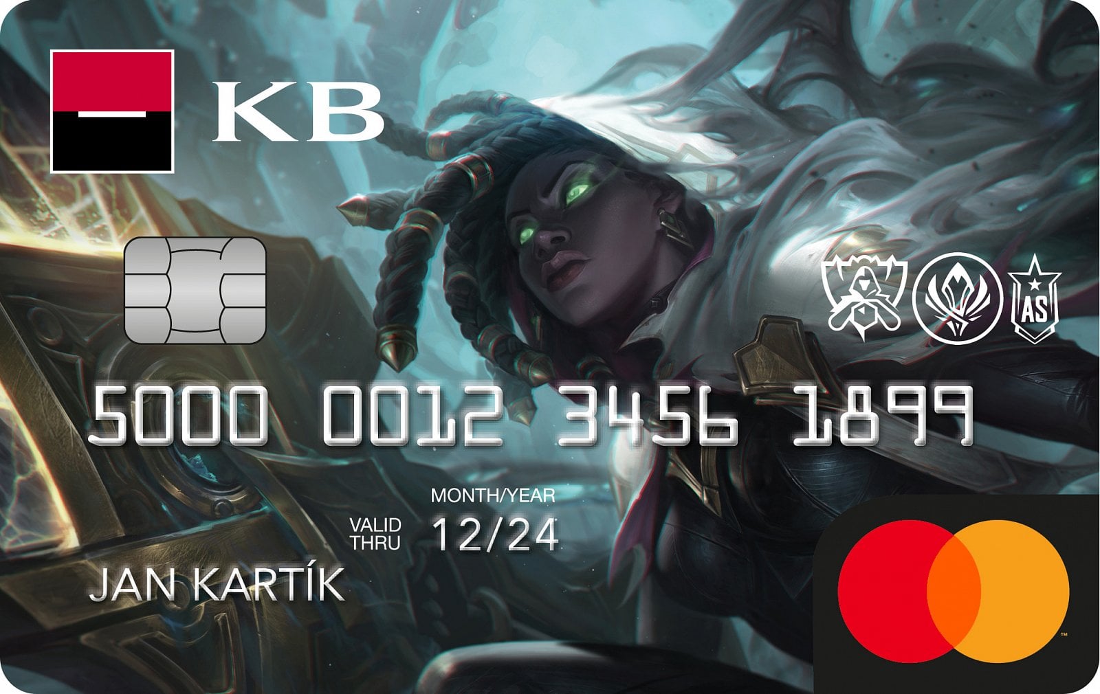 Debetní nebo kreditní karta Komerční banky speciální edice s obrázkem sochy Senny z online hry League of Legends. Senna je podpůrná střelkyně, která ochraňuje své parťáky a sbírá duše padlých protivníků. (09/2021)