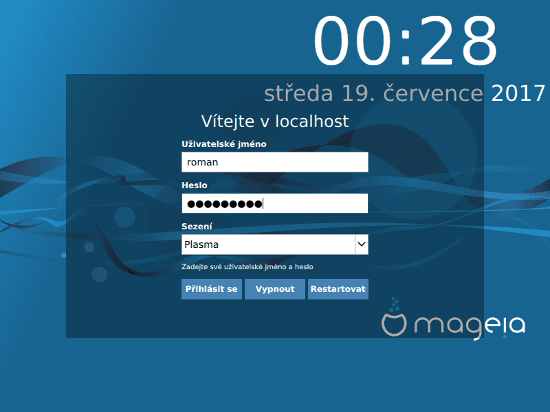 Přihlašovací obrazovka s možností výběru grafického prostředí (sezení).