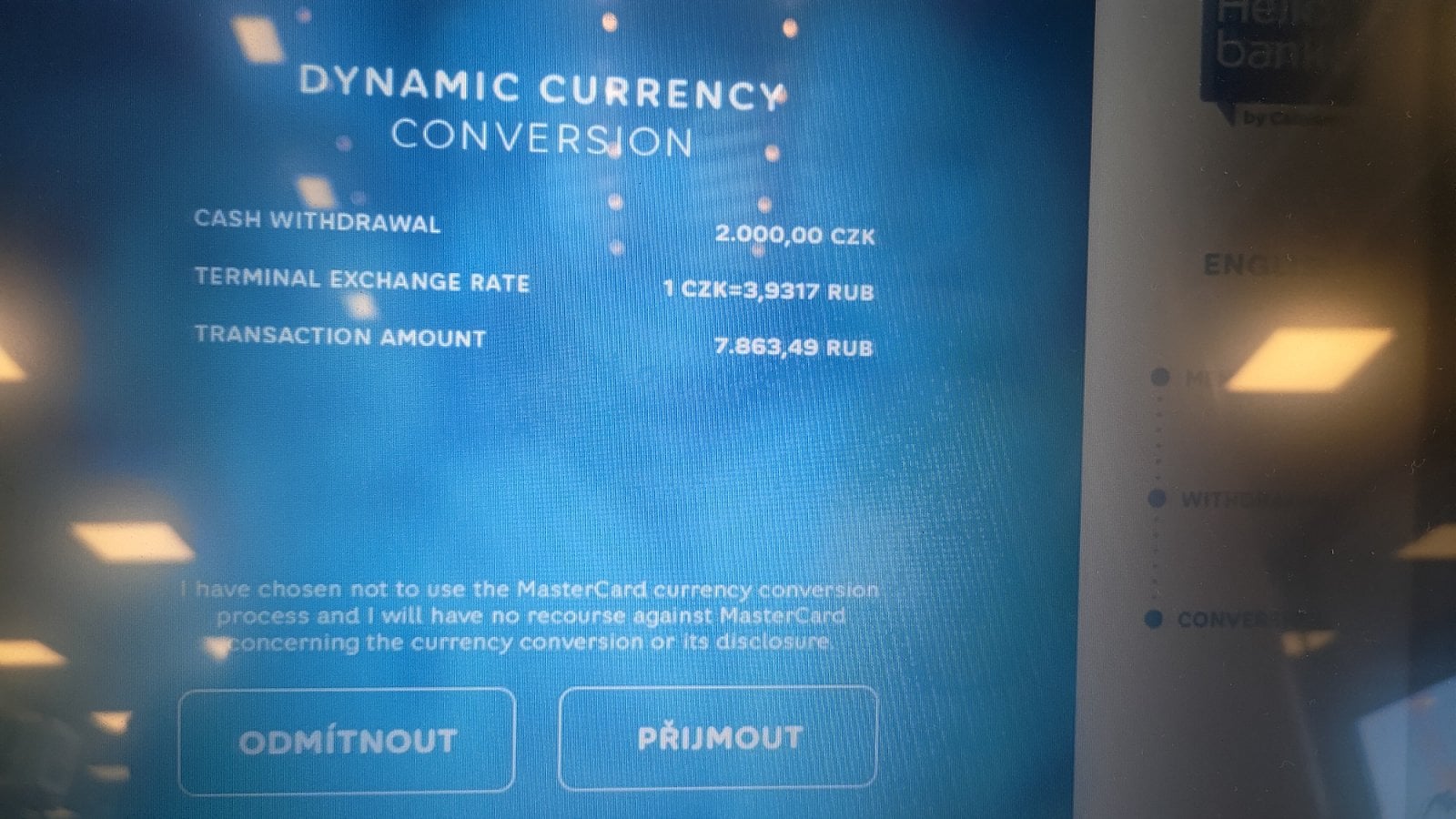 Hello bank!. Bankomat nabízí DCC pro platební kartu vedenou v RUB. Kurzová marže není uvedena. (05/2021)